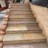 Treppe im Garten mit Natursteinplatten Hartsandstein India Gelb